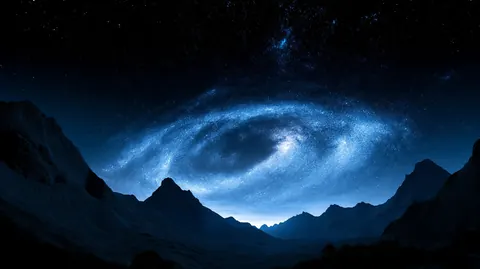A blue spiral galaxy fills the night sky above a jagged mountain ridge.