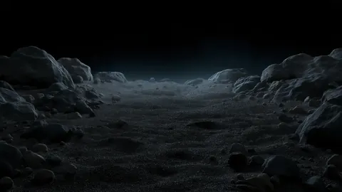 A dark, rocky wasteland of black boulders under a dark sky.