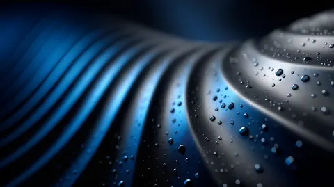 Curved bands of blue and silver sweep around a center point, covered in tiny water droplets.