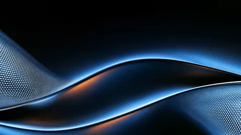 A curved sheet of fine perforated mesh flows through blue light, catching a thin copper glow at its edge.