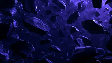 Broken indigo shards float in a deep violet space, scattered like pieces of a frozen moment.