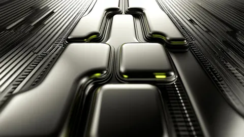 Polished silver channels and raised pads form a close-up circuit landscape, with small jade lights between them.