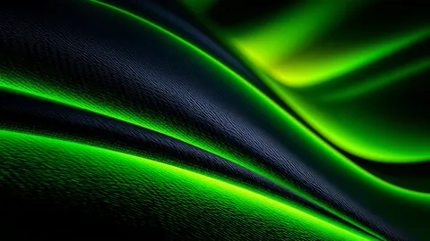 Bright lime-green light traces the edges of soft folds in a dark, finely textured surface.