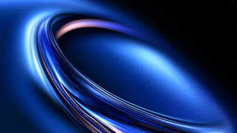 Curved blue light fibers sweep around in an oval orbit on a deep blue background.